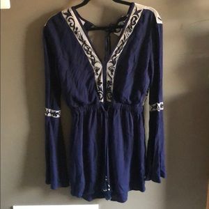 Long sleeve blue backless romper, never worn!